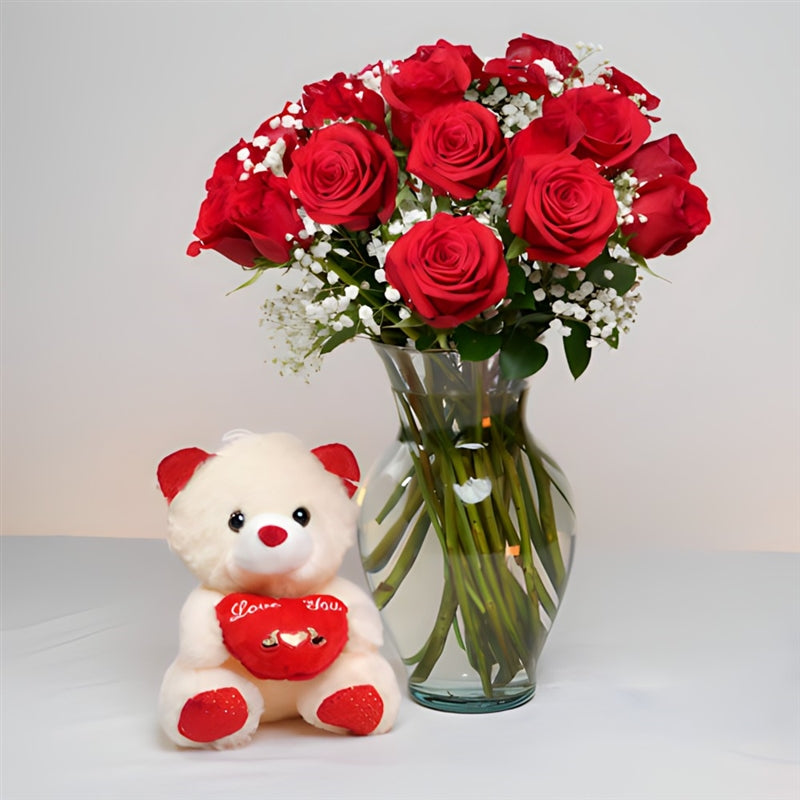 Dozen red roses bouquet with teddy bear