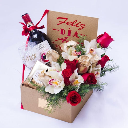 Luxury Arrangement with wine, roses and chocolates.