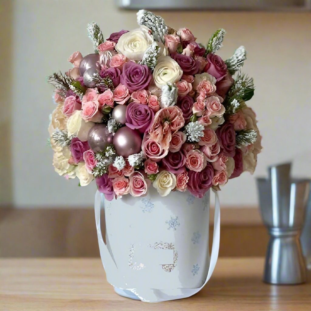 Elegant Christmas Arrangement with Pink and White Roses and Silver Ornaments