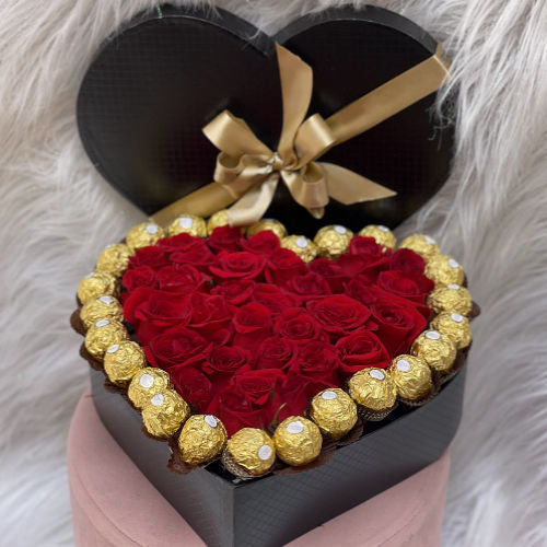 Heart-shaped box with Ferrero chocolates and red roses, available for delivery in Bogotá, Medellín, Cúcuta,  Pereira Colombia